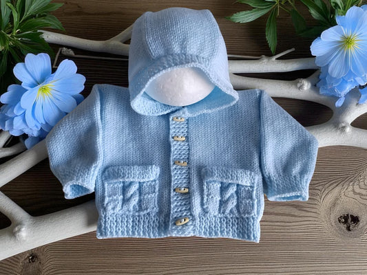 Unisex knitted hoodie with cable pockets