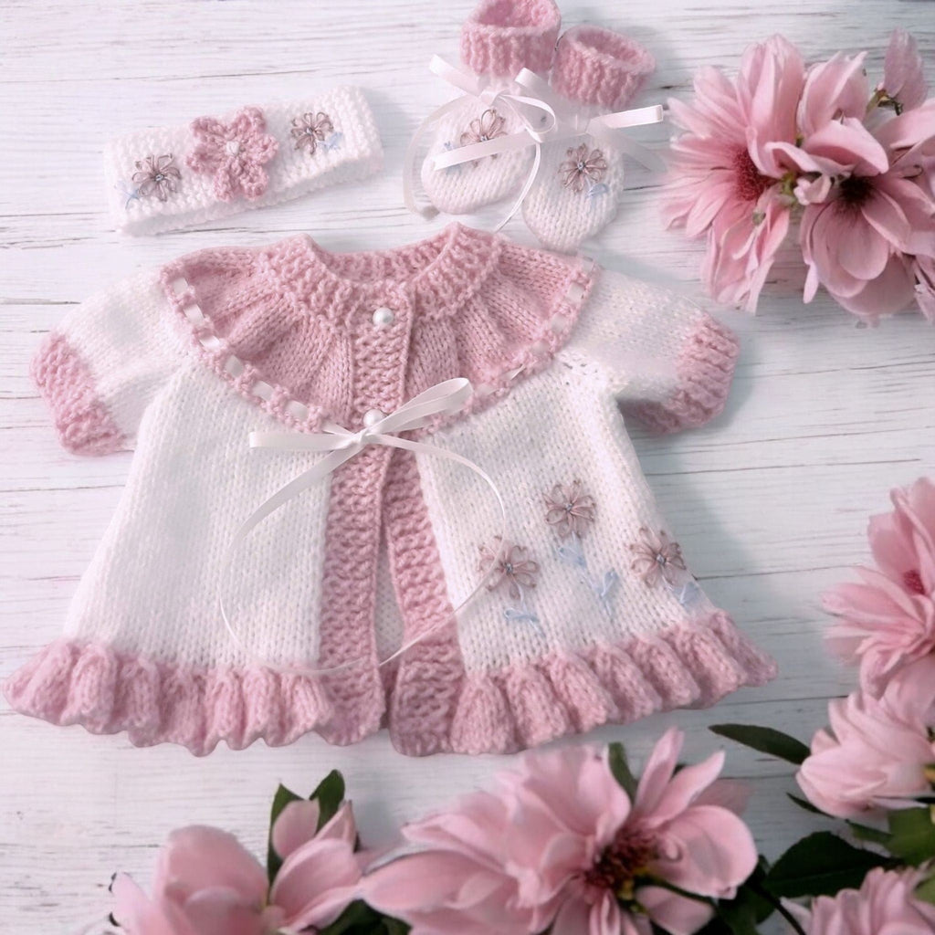 gemknits4kids hand knitted baby girl outfit in soft white & rose with floral embroidery, including cardigan, headband, boots