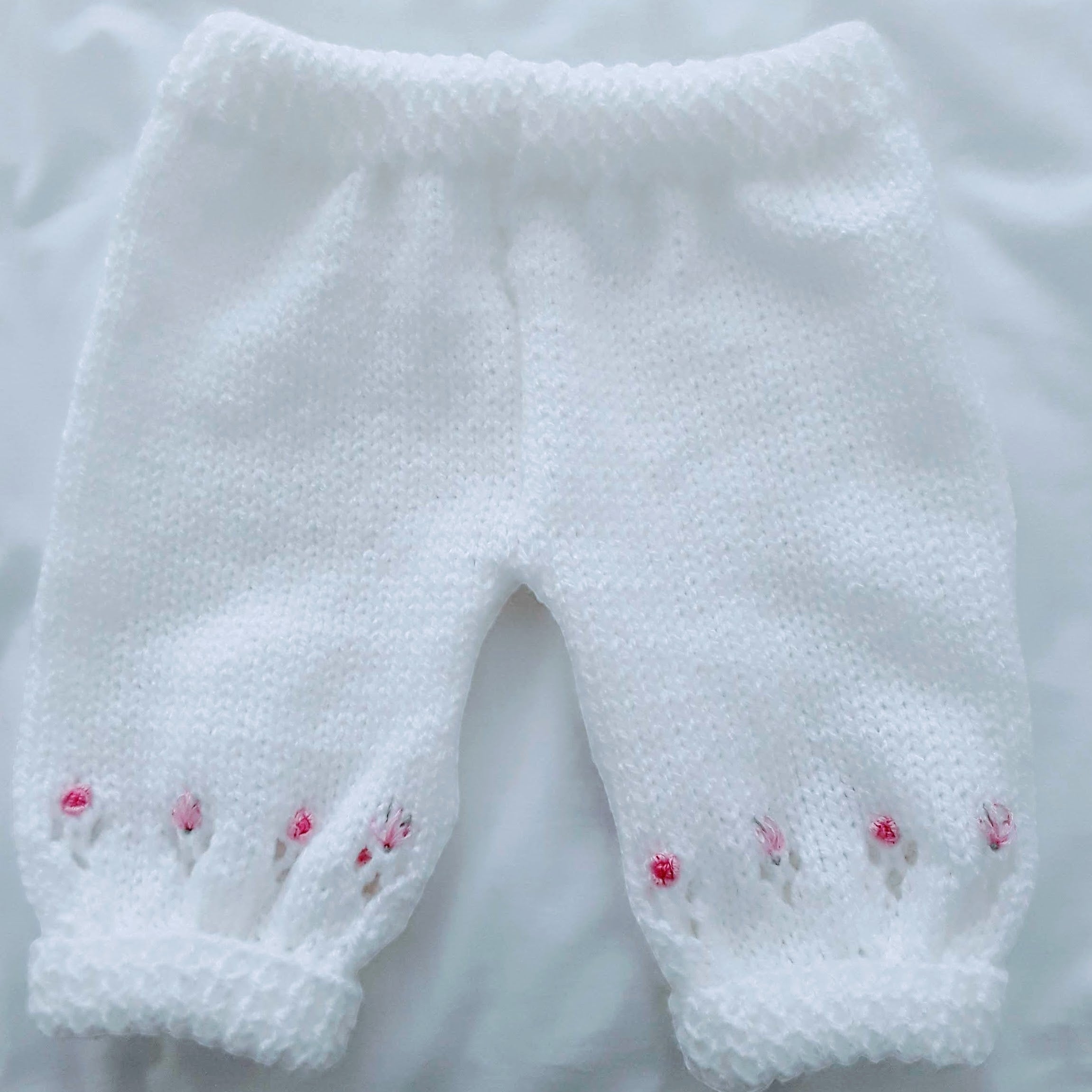Hand knitted baby girl leggings embroidered to match any outfit
