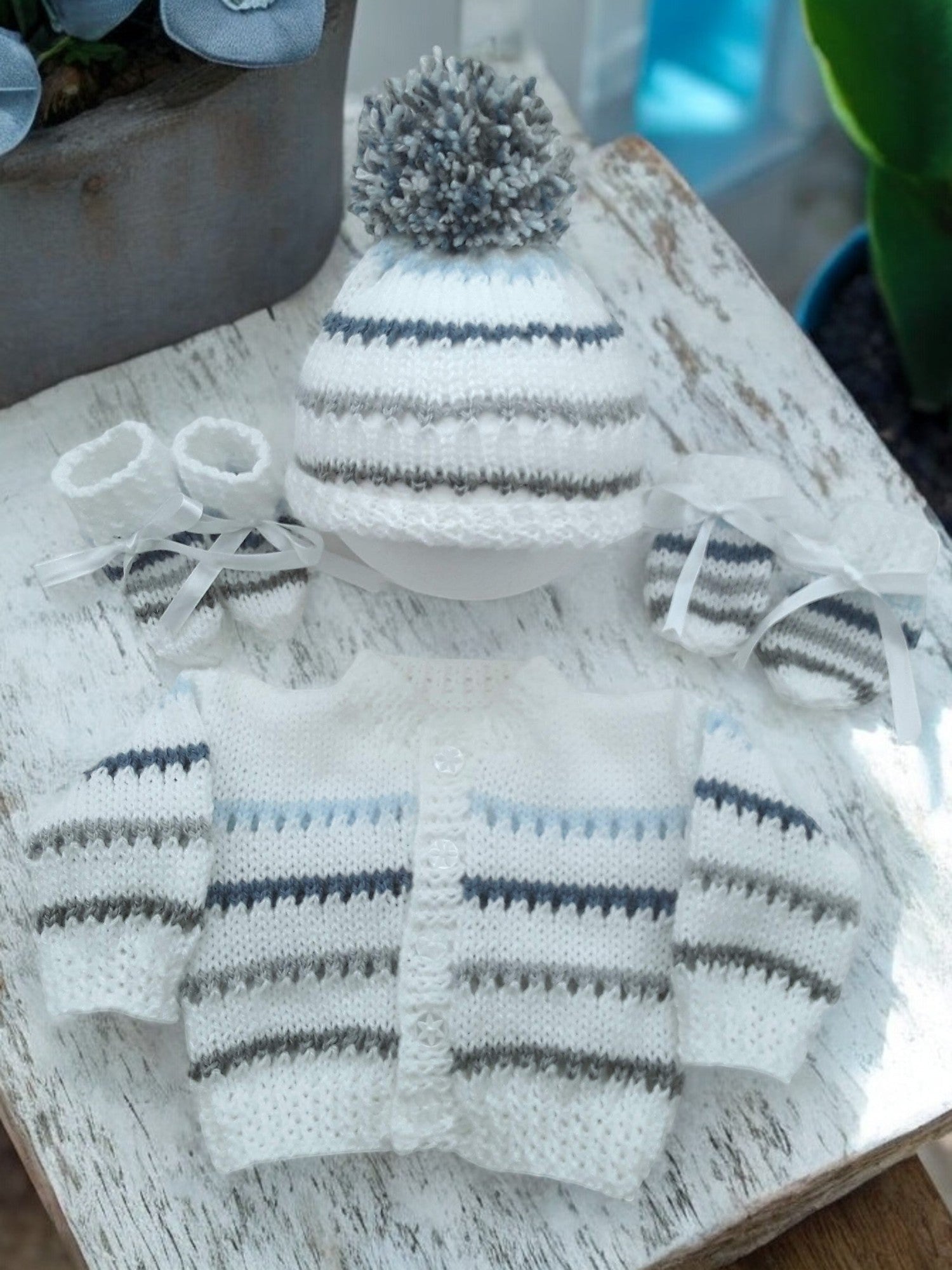 Beautiful handmade gender neutral baby outfit with cardigan, hat and boots. Perfect newborn gift or baby shower present. Sizes Premature to 2 Years.