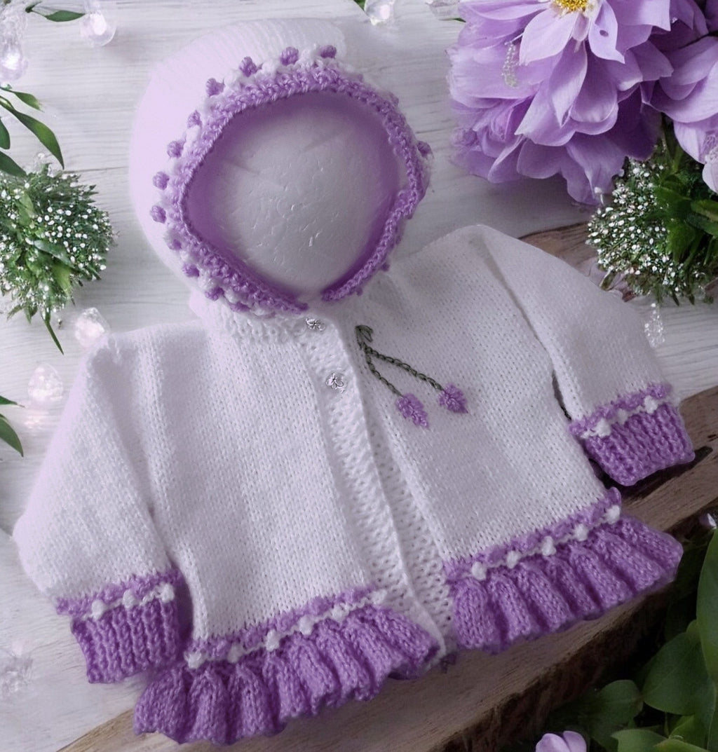 Designer hand knitted baby girl frilly cardigan with hood, floral embroidery in white & heather