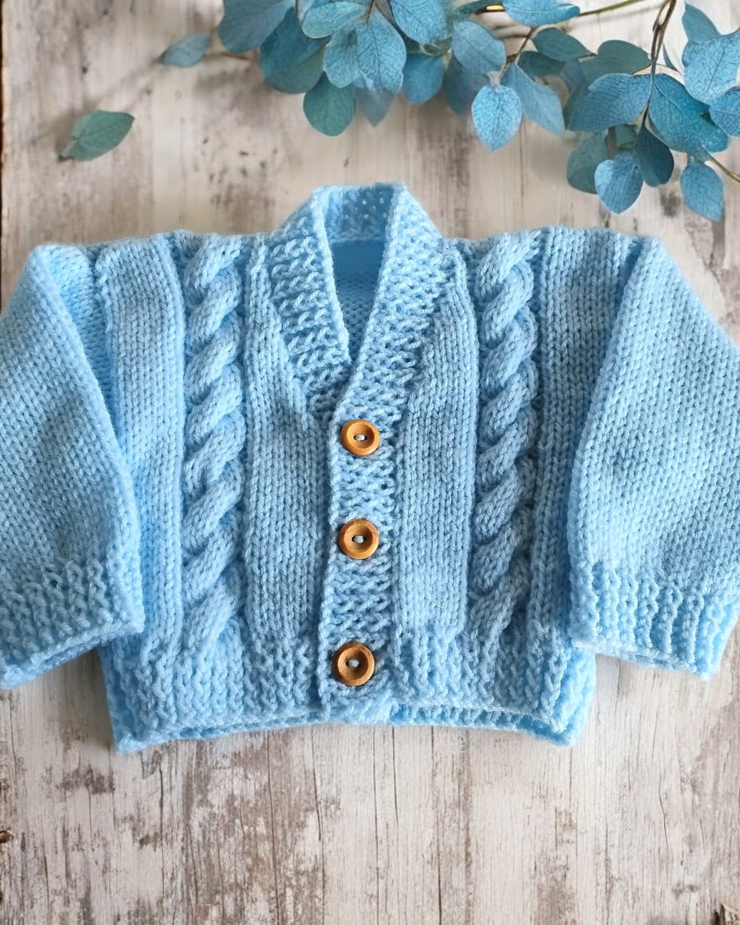 Hand knitted  Baby Cardigan with cable design