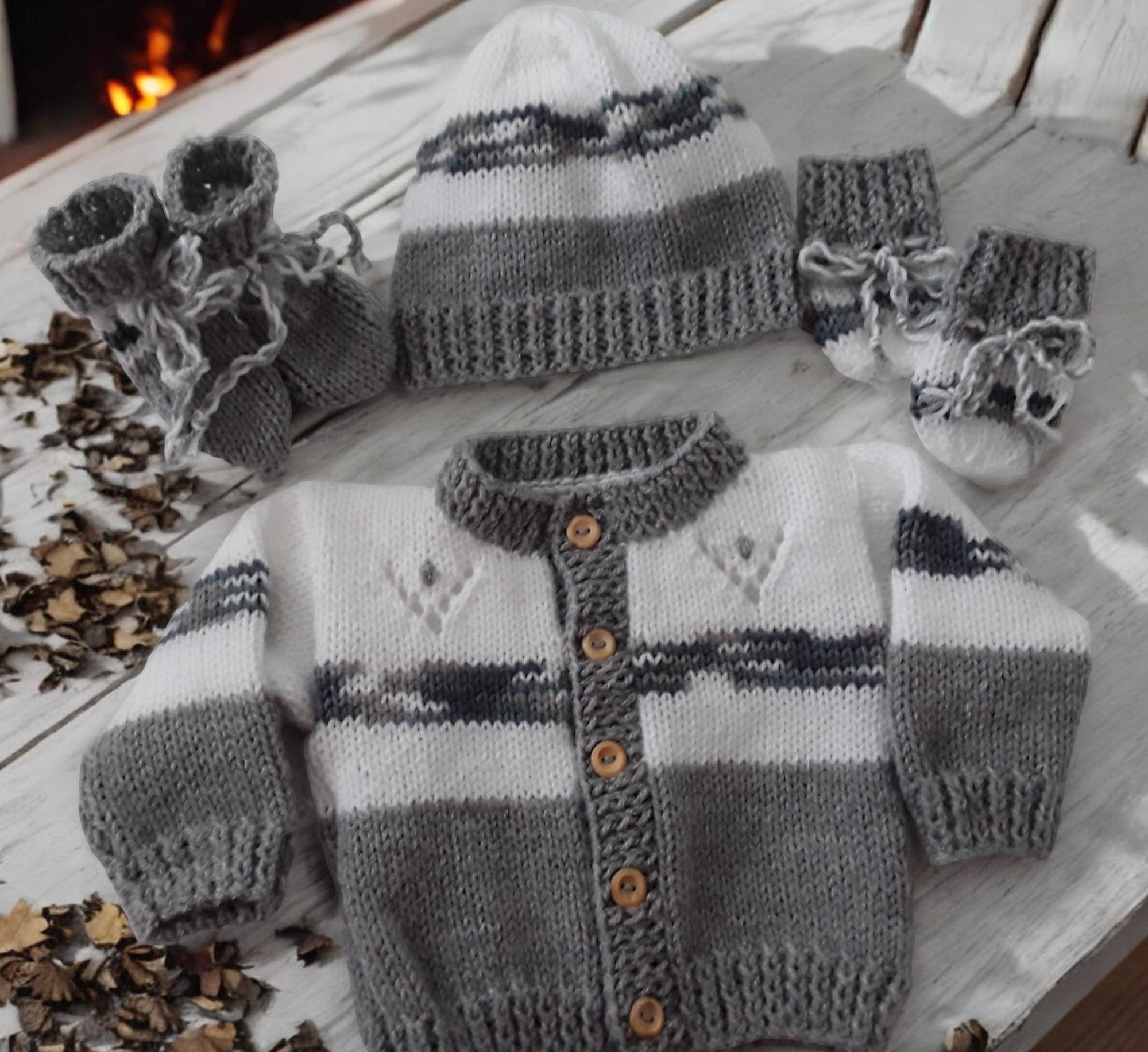 gemknits4kids hand-knitted stripe cardigan, matching hat, and booties.