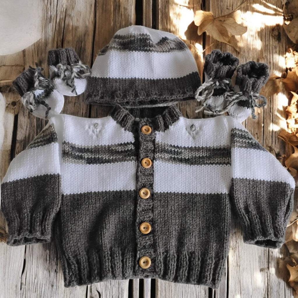 gemknits4kids hand-knitted cardigan, matching hat, and red booties.