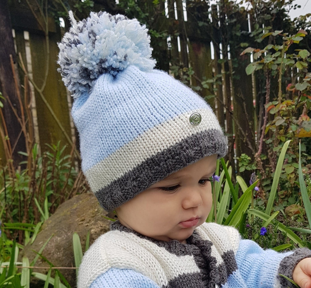 Knitted pom pom hat
