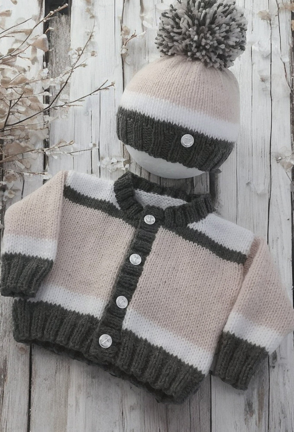 gemknits4kids hand-knitted boys' cardigan and pom pom hat set in beige, white, and dark green block design.