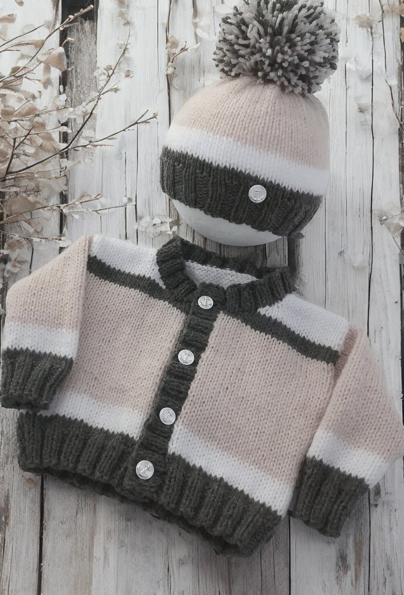 gemknits4kids hand-knitted boys' cardigan and pom pom hat set in beige, white, and dark green block design.