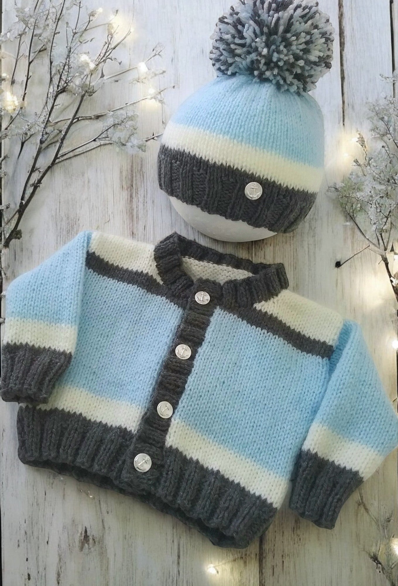 gemknits4kids boys hand-knitted color-block cardigan and matching pom pom hat in blue, white, and grey acrylic yarn