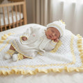 gemknits4kids hand-knitted baby girl outfit with matching pram cover in white and yellow with frilly bonnet and booties