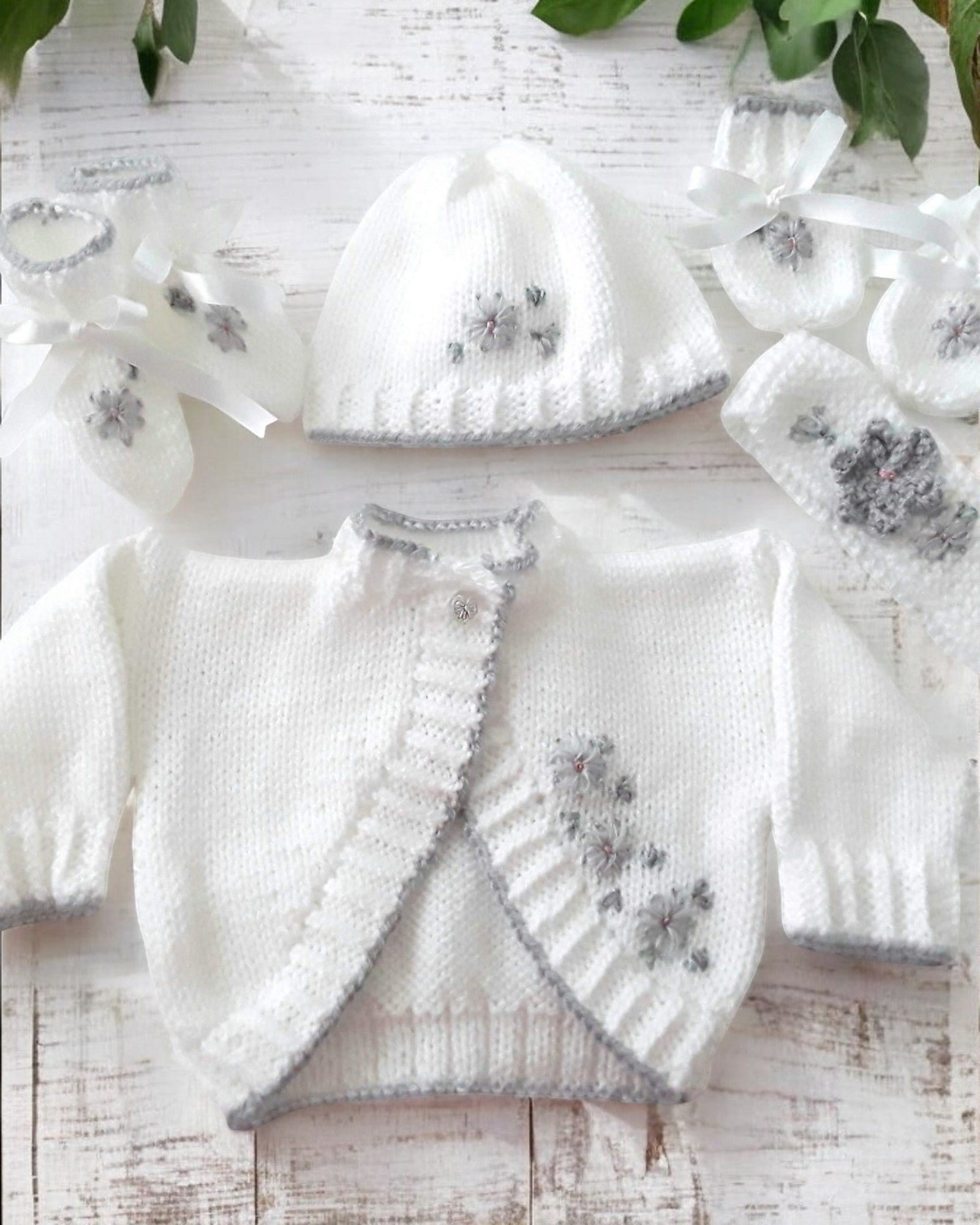 gemknits4kids white hand-knitted bolero cardigan with silver embroidery