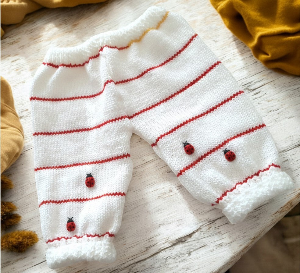 gemknits4kids white knitted baby leggings with red stripes and cute ladybird embroidery