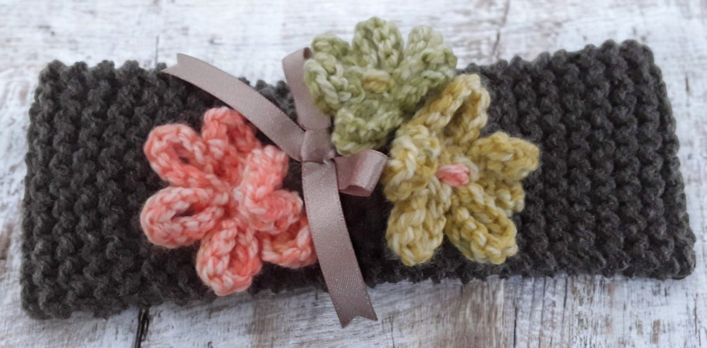 hand knitted headband with knitted flowers