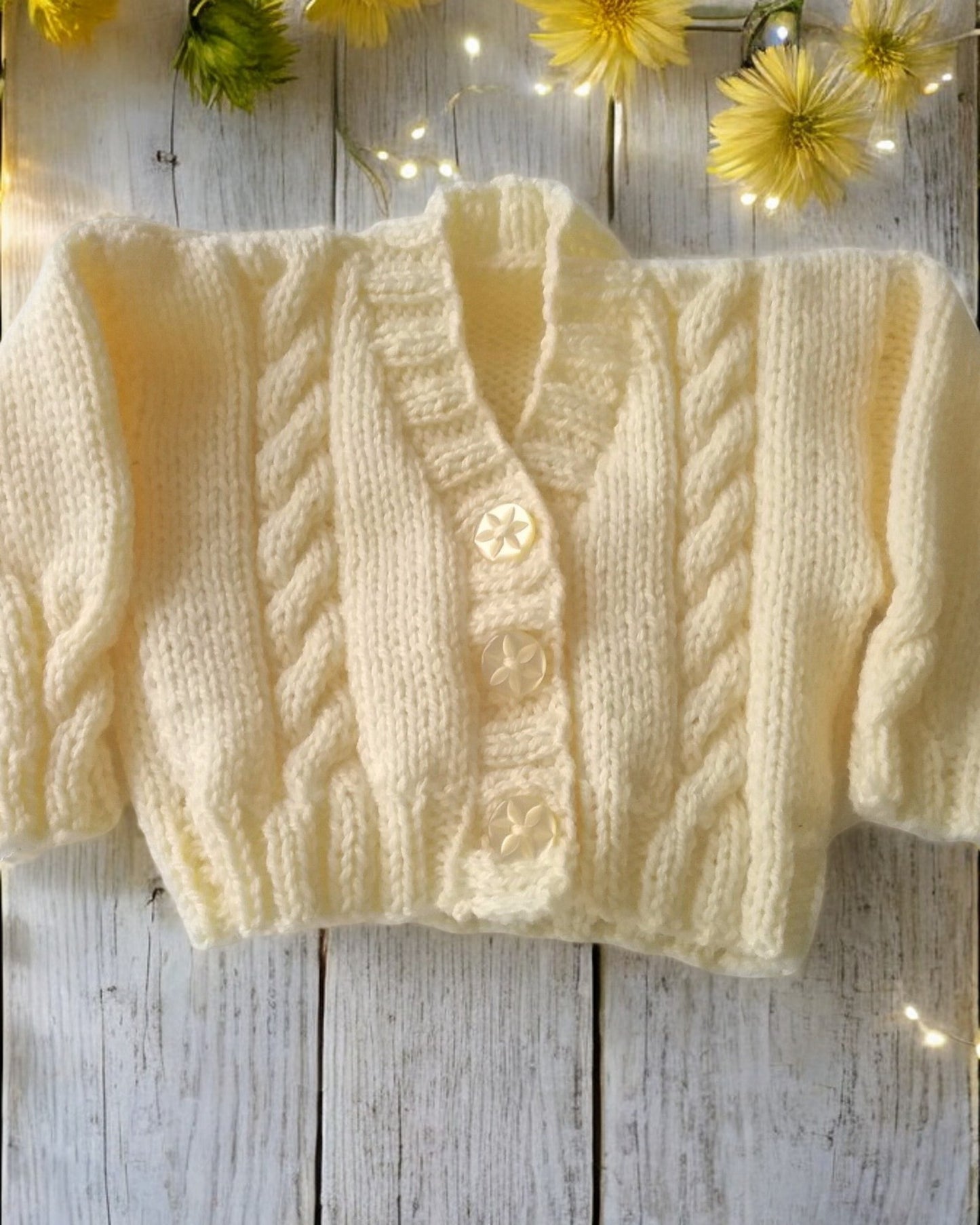 Hand knitted  Baby Cardigan with cable design