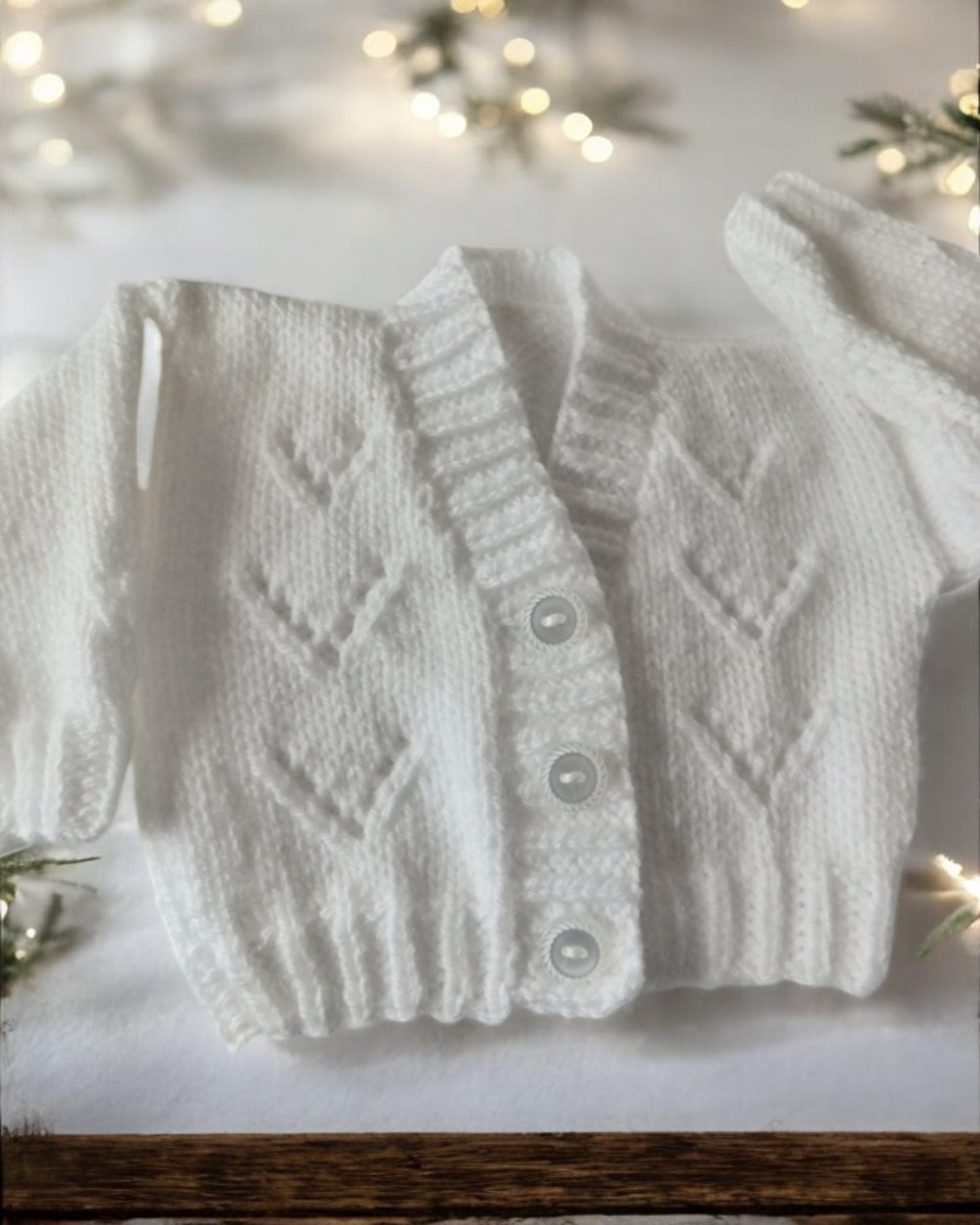 Adorable Knitted Baby Cardigan with traditional design and V neck - Perfect for Little Ones!